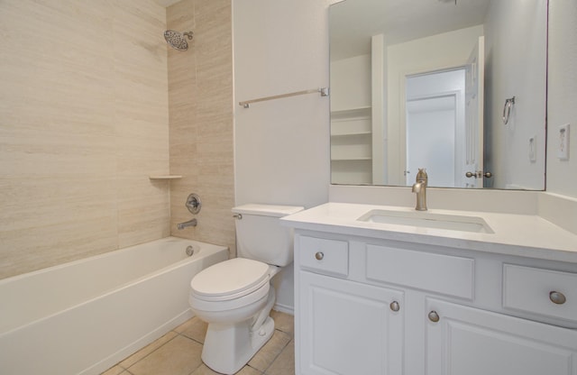 full bathroom with tile patterned flooring, vanity, tiled shower / bath combo, and toilet