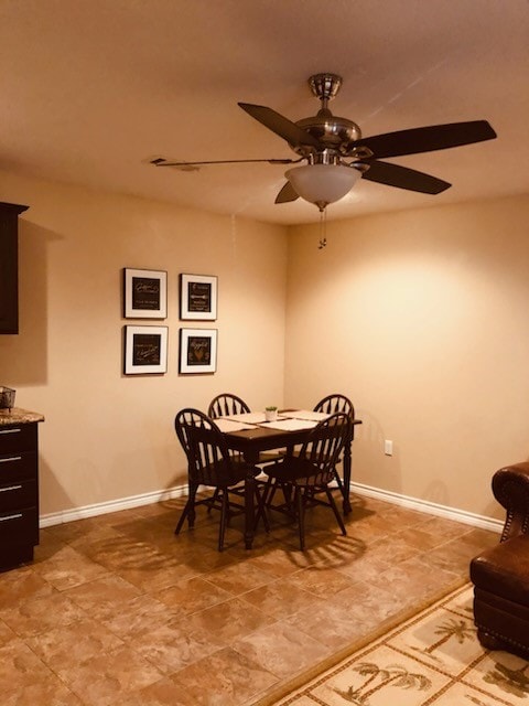 dining area with ceiling fan