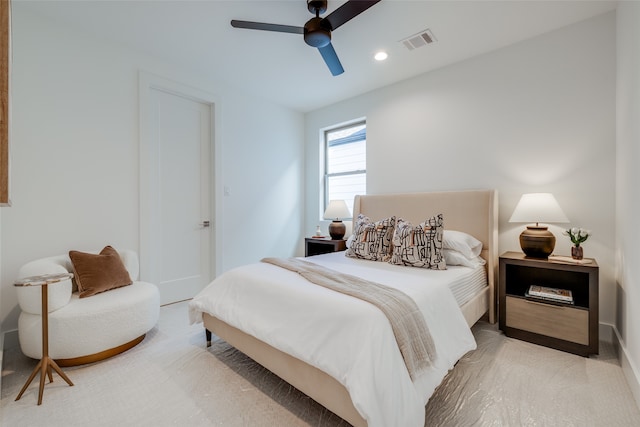 carpeted bedroom with ceiling fan