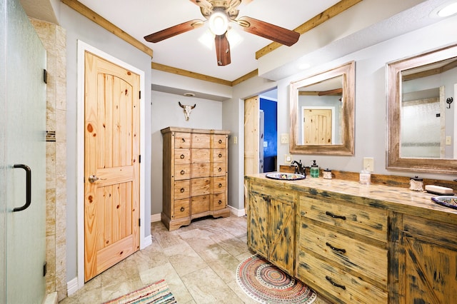 bathroom featuring ceiling fan, vanity, and walk in shower