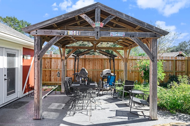 view of patio / terrace featuring a gazebo and area for grilling