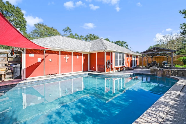 view of swimming pool with a gazebo and a patio area