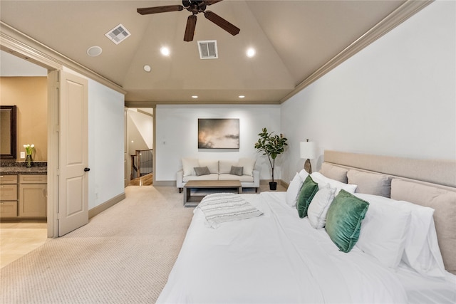 carpeted bedroom featuring ceiling fan, crown molding, high vaulted ceiling, and ensuite bath