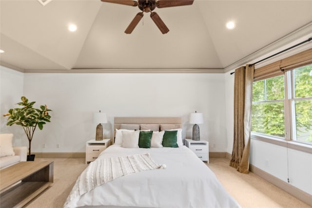 bedroom with light carpet, vaulted ceiling, and ceiling fan