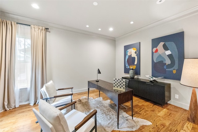 office space featuring light hardwood / wood-style flooring and crown molding