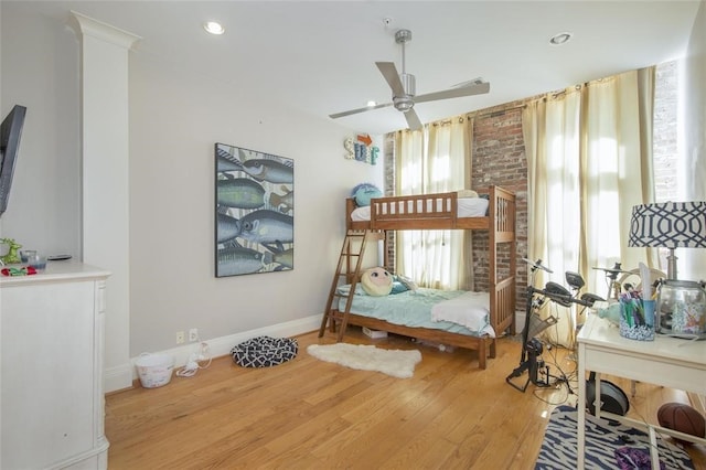 bedroom with hardwood / wood-style floors