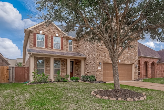 view of front of house with a garage and a front lawn