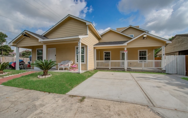 view of front of house featuring a front yard and a porch