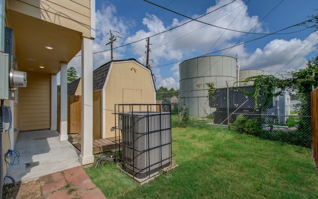 view of yard featuring central air condition unit