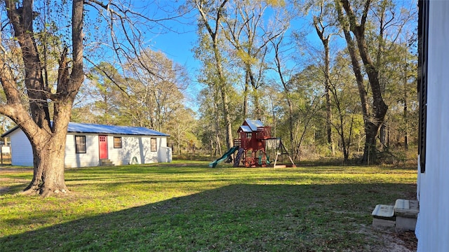 view of yard with a playground