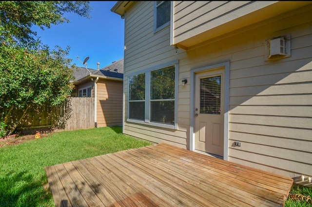 wooden terrace with a yard