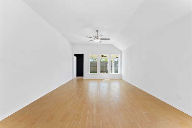 unfurnished living room with ceiling fan, light hardwood / wood-style floors, and lofted ceiling