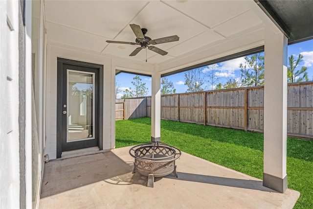 view of patio / terrace featuring ceiling fan and an outdoor fire pit