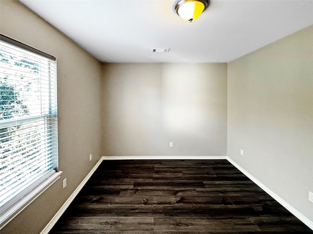 1519 Hannington Dr, Katy, TX 77450 - unfurnished room with dark wood finished floors and baseboards