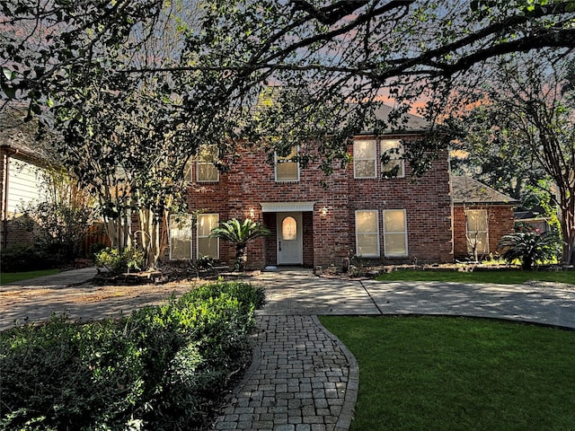 1519 Hannington Dr, Katy, TX 77450 - view of front facade featuring a front lawn and brick siding