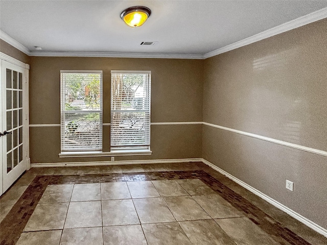 1519 Hannington Dr, Katy, TX 77450 - tiled empty room with crown molding, baseboards, french doors, and inlaid floor details