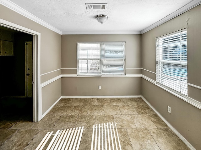 1519 Hannington Dr, Katy, TX 77450 - spare room with healthy amount of natural light, crown molding, a textured ceiling, and baseboards