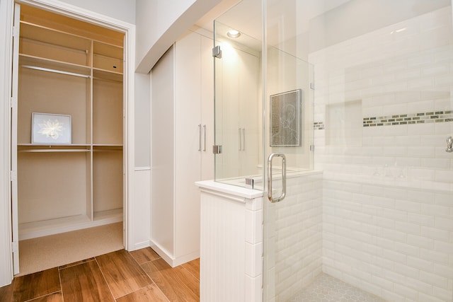 bathroom with an enclosed shower