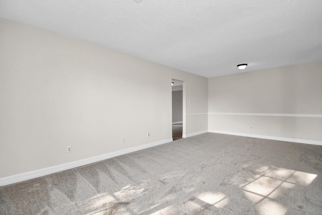 unfurnished room featuring carpet floors