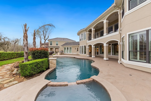 view of pool with a patio area