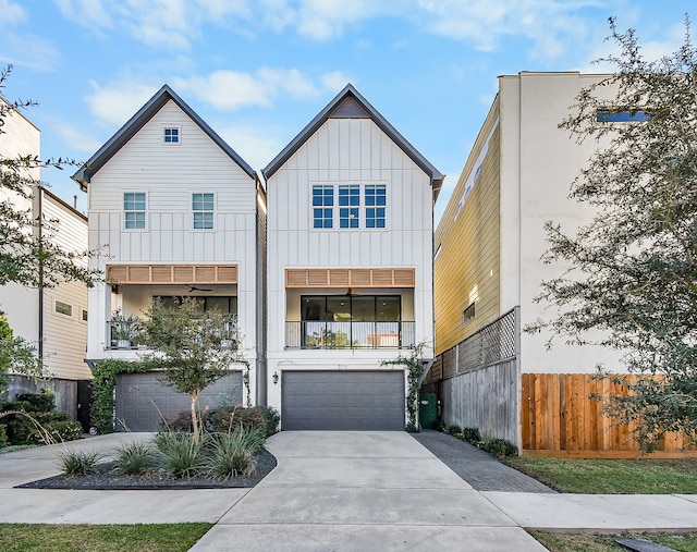 view of front of home featuring a garage and a balcony