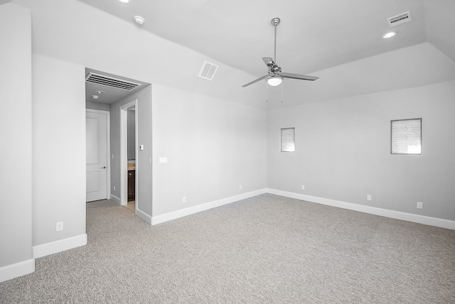 carpeted empty room featuring ceiling fan