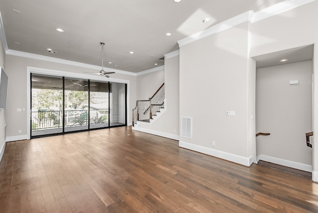 unfurnished living room featuring crown molding, ceiling fan, and dark wood-type flooring