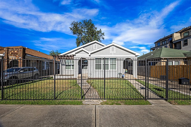 view of front of home with a front yard