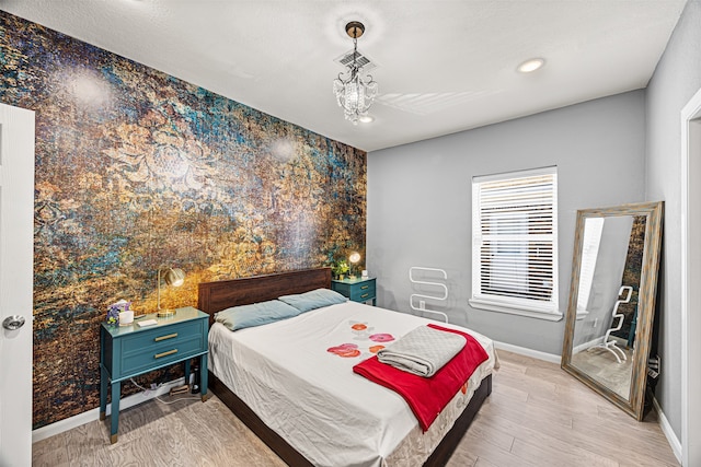 bedroom featuring light wood-type flooring