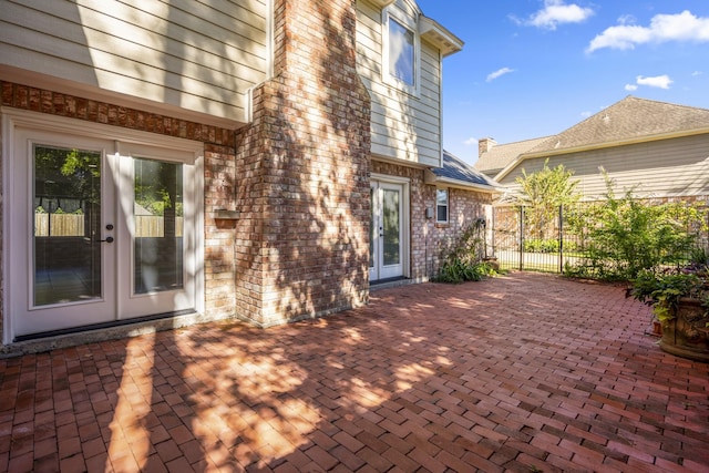 12114 Knobcrest Dr, Houston, TX 77070 - view of patio / terrace with french doors and fence