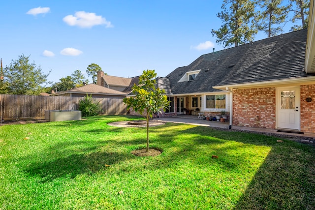 view of yard with a patio area