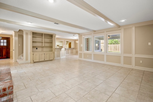 unfurnished living room featuring built in features, a textured ceiling, and light tile patterned floors