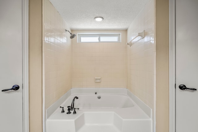 bathroom featuring a textured ceiling