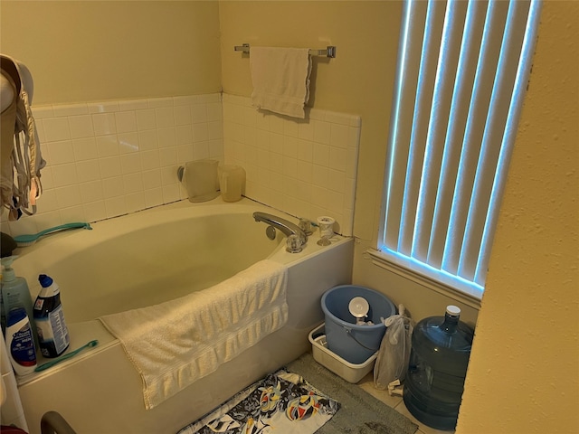 bathroom with a tub