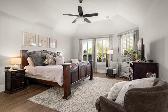 bedroom with vaulted ceiling, light hardwood / wood-style floors, and ceiling fan