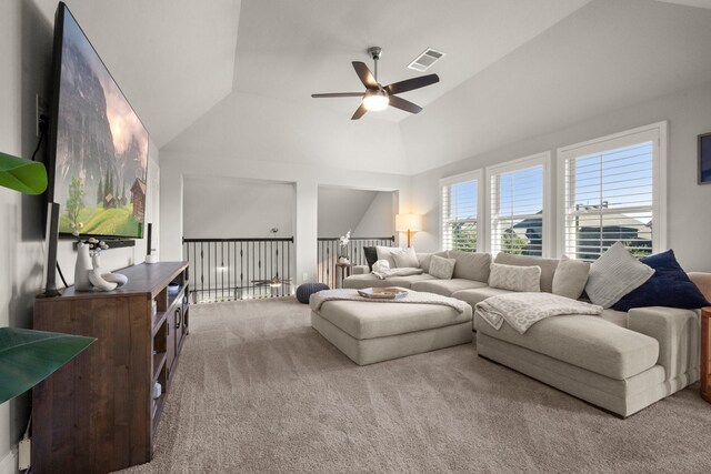 carpeted living room featuring lofted ceiling and ceiling fan