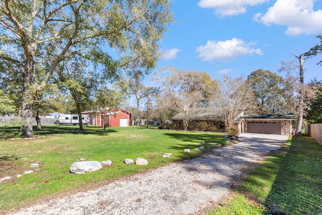 view of yard with a garage