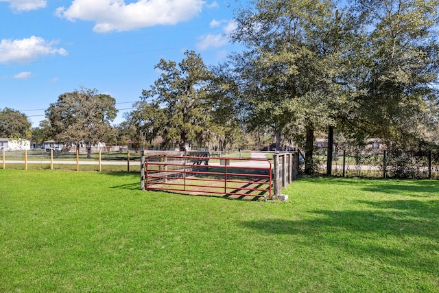 view of home's community featuring a lawn