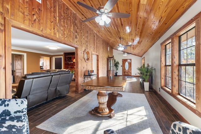 dining space with dark hardwood / wood-style floors, wooden ceiling, crown molding, and high vaulted ceiling