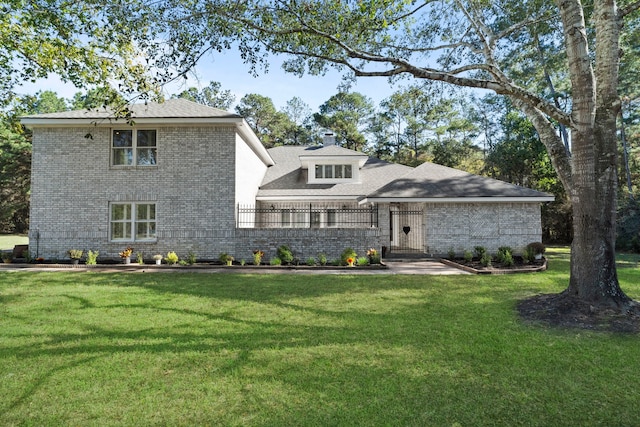 view of front of property with a front lawn