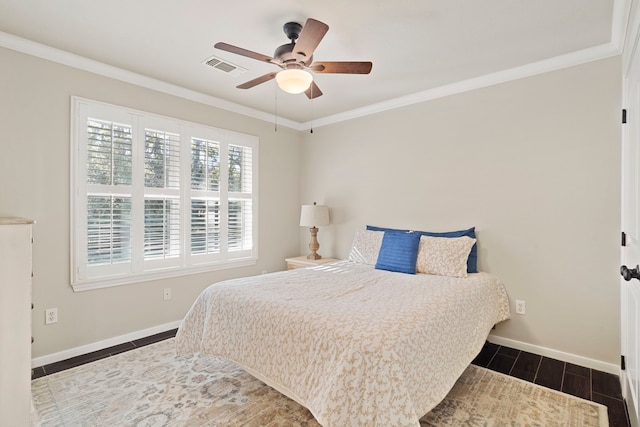 bedroom featuring ceiling fan and crown molding