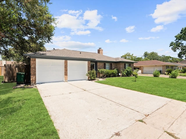 ranch-style house with a garage and a front yard