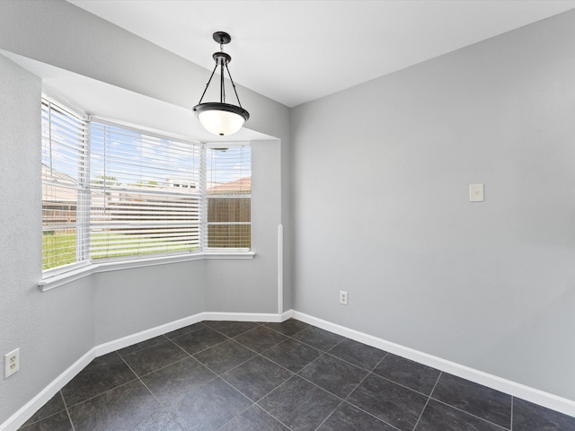 view of tiled spare room