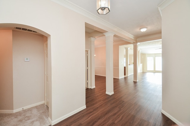 hallway featuring dark hardwood / wood-style floors and ornamental molding