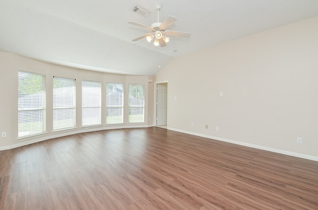 unfurnished room with dark wood-type flooring, ceiling fan, and lofted ceiling