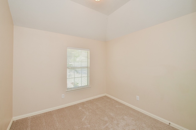 empty room featuring light carpet