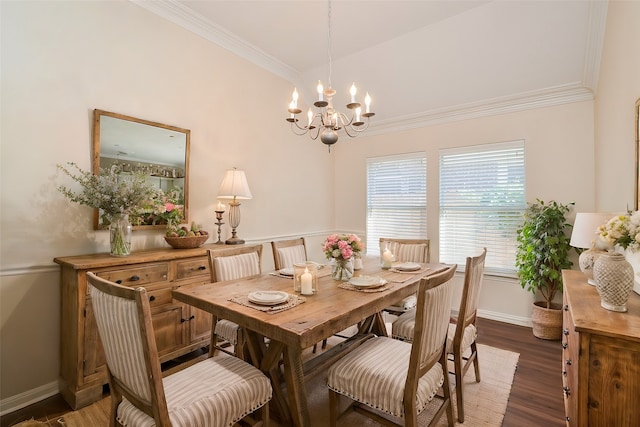 dining area featuring ornamental molding, dark hardwood / wood-style floors, and an inviting chandelier