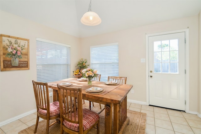 dining space with light tile patterned floors