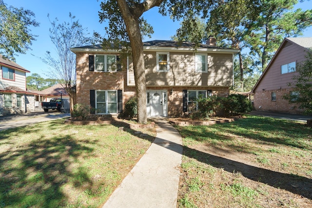 view of front of house with a front lawn