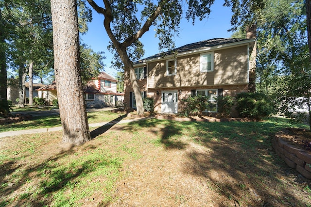 view of front of property with a front lawn